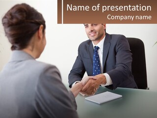 A Man Shaking Hands With A Woman At A Desk PowerPoint Template