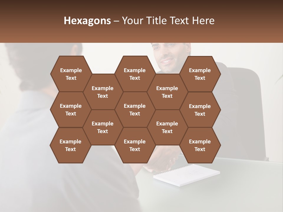 A Man Shaking Hands With A Woman At A Desk PowerPoint Template