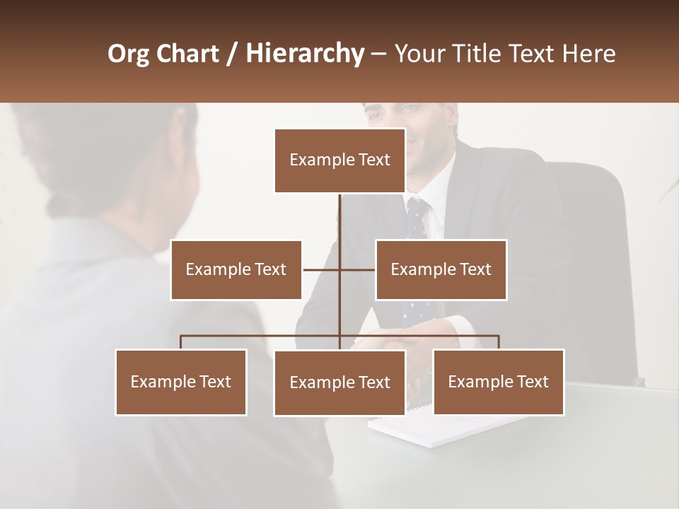 A Man Shaking Hands With A Woman At A Desk PowerPoint Template