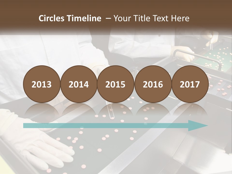 Two People In White Lab Coats Working On A Machine PowerPoint Template