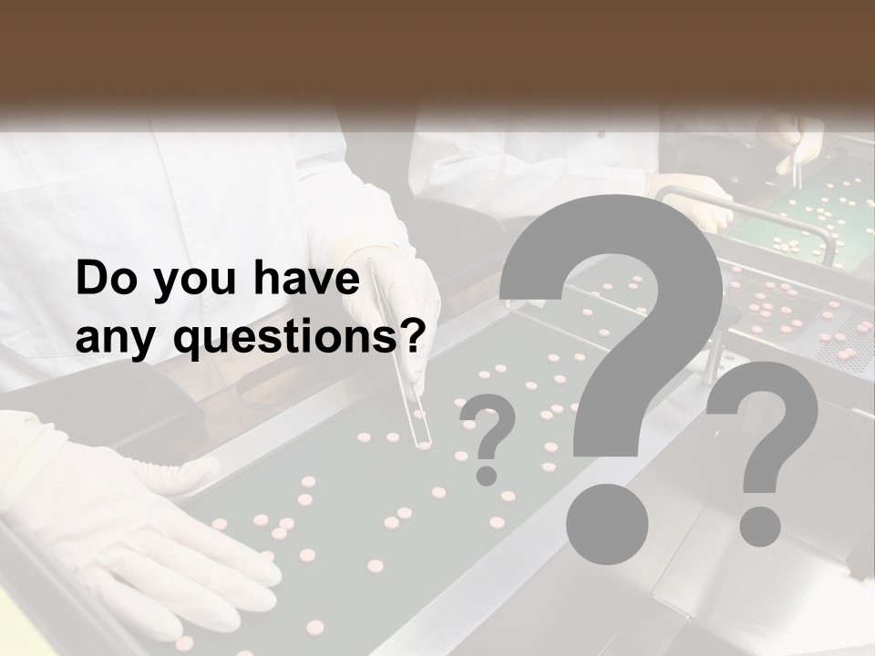 Two People In White Lab Coats Working On A Machine PowerPoint Template