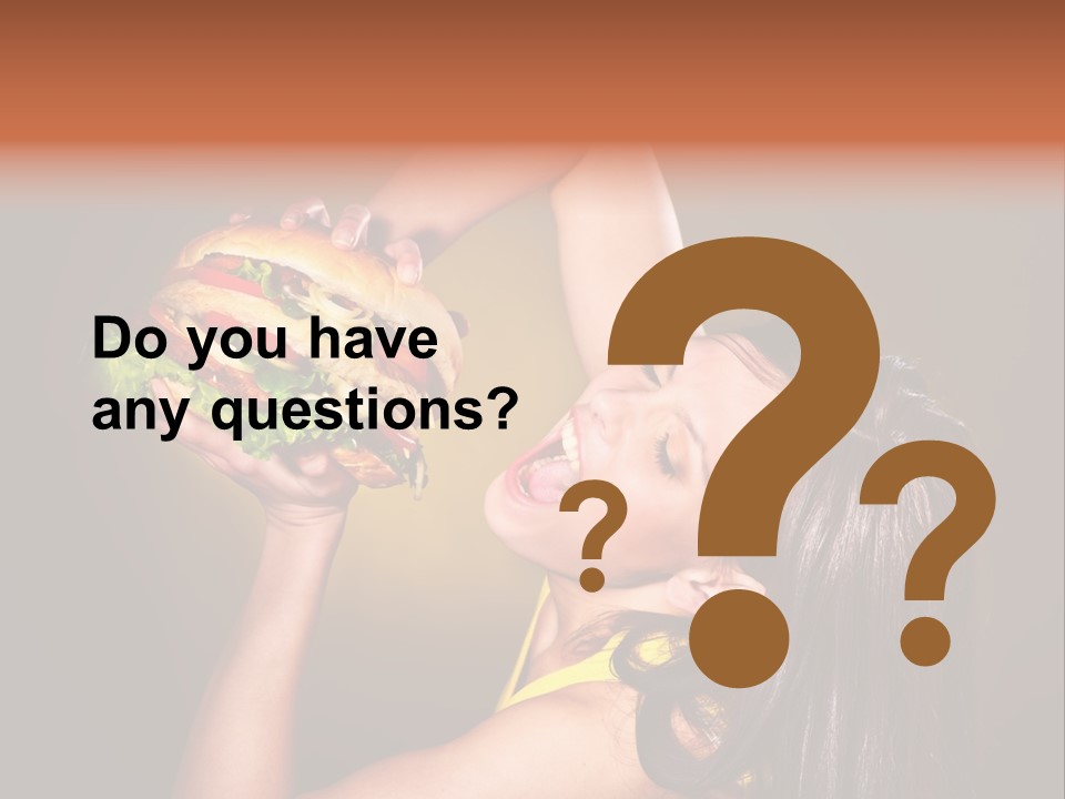 A Woman Holding A Large Hamburger Up To Her Face PowerPoint Template