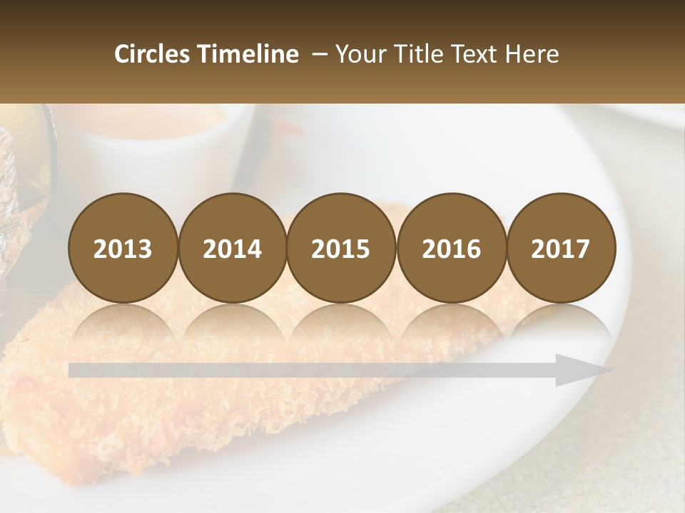 A White Plate Topped With A Piece Of Fish Next To A Cup Of Sauce PowerPoint Template