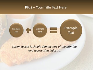 A White Plate Topped With A Piece Of Fish Next To A Cup Of Sauce PowerPoint Template