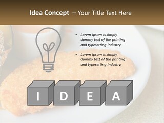 A White Plate Topped With A Piece Of Fish Next To A Cup Of Sauce PowerPoint Template