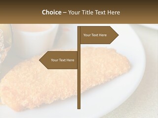 A White Plate Topped With A Piece Of Fish Next To A Cup Of Sauce PowerPoint Template