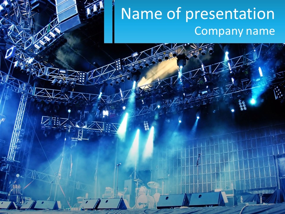 A Stage That Has Some Lights On It PowerPoint Template