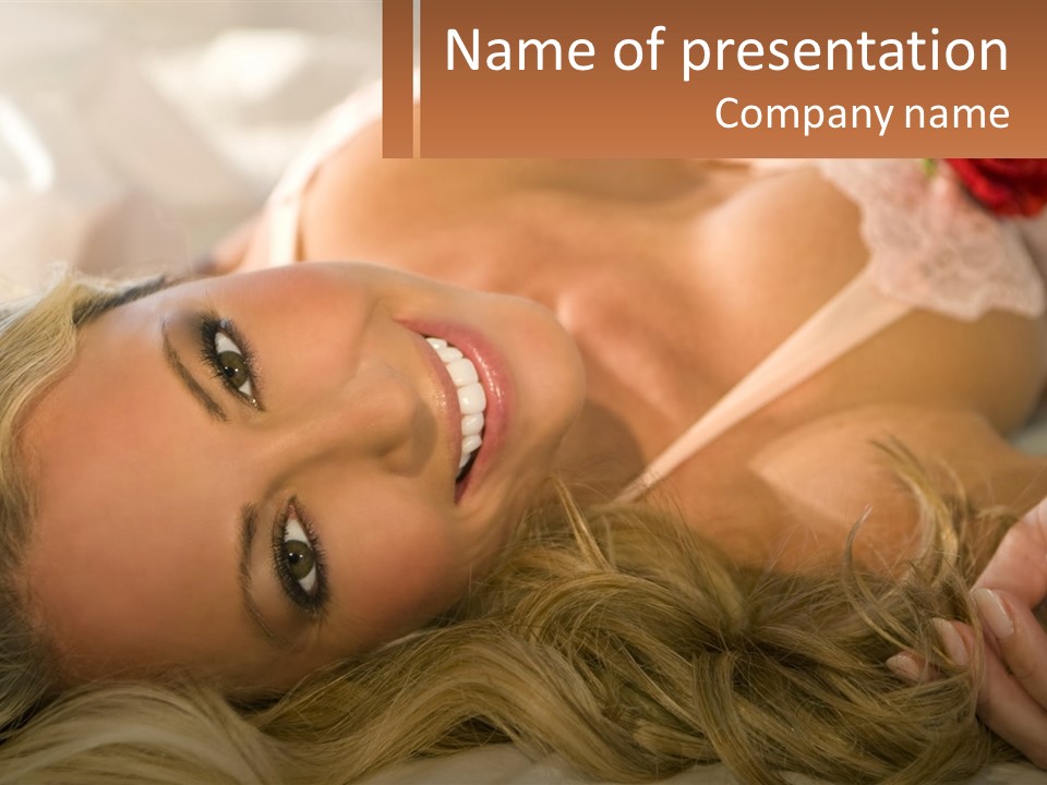 A Beautiful Woman Laying On Top Of A Bed PowerPoint Template