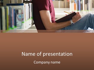 A Man Sitting In A Library Reading A Book PowerPoint Template