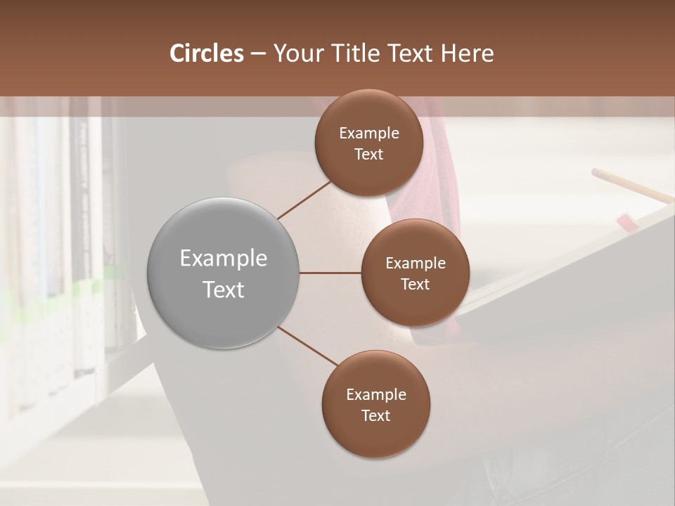 A Man Sitting In A Library Reading A Book PowerPoint Template