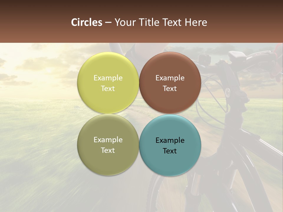 A Person Riding A Bike Down A Dirt Road PowerPoint Template