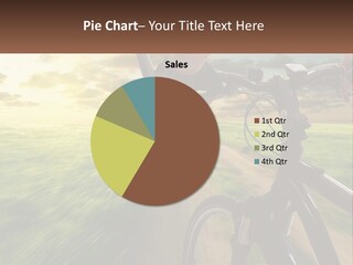 A Person Riding A Bike Down A Dirt Road PowerPoint Template