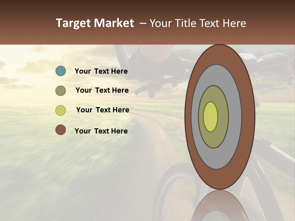 A Person Riding A Bike Down A Dirt Road PowerPoint Template