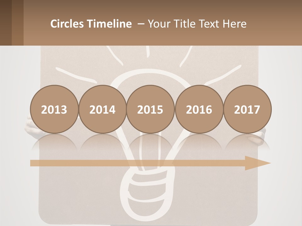 A Person Holding A Sign With A Light Bulb On It PowerPoint Template