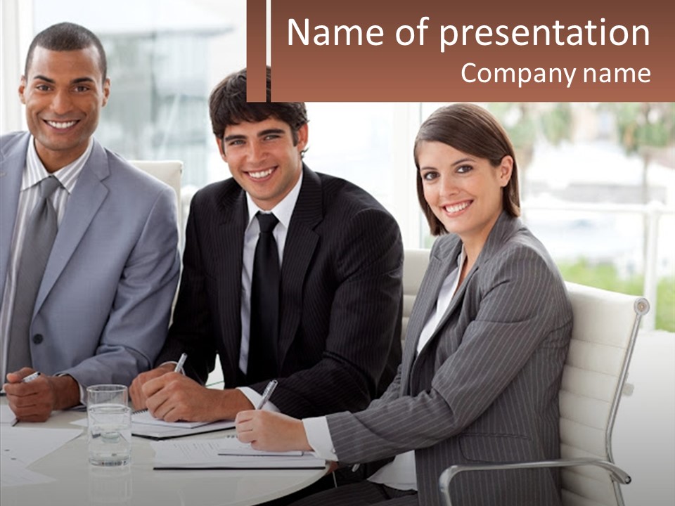 A Group Of Business People Sitting At A Table PowerPoint Template