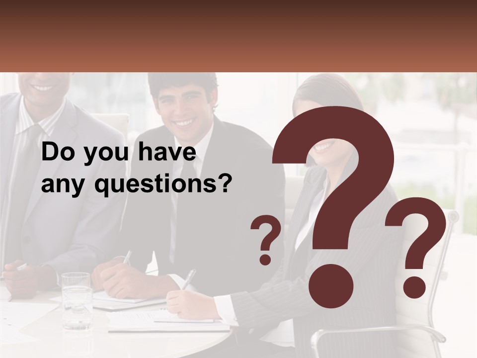 A Group Of Business People Sitting At A Table PowerPoint Template