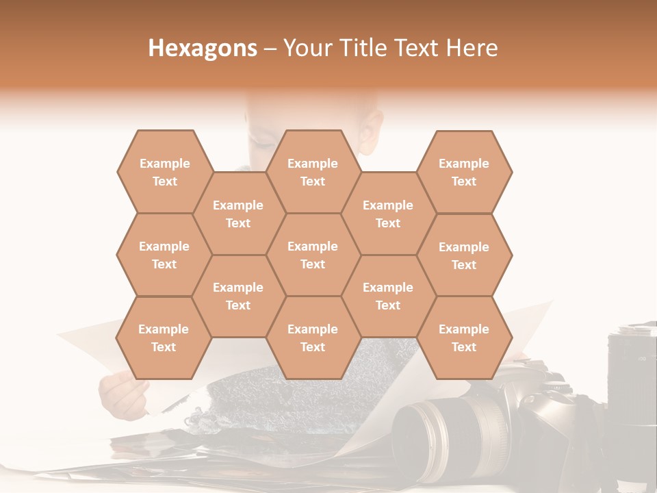 A Baby Reading A Book Next To A Camera PowerPoint Template