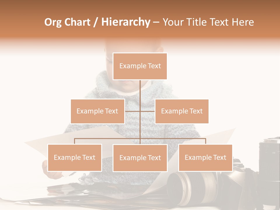 A Baby Reading A Book Next To A Camera PowerPoint Template