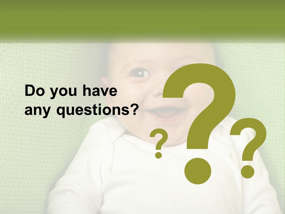 A Baby Laying On Top Of A Green Blanket PowerPoint Template