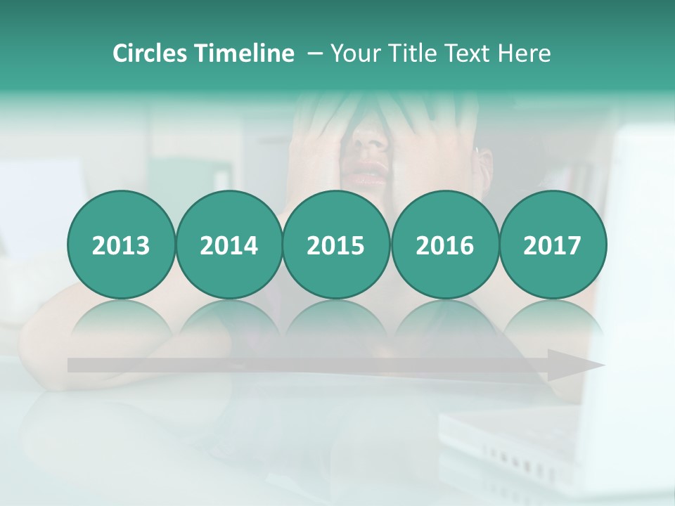 A Woman Covering Her Eyes While Sitting At A Desk PowerPoint Template