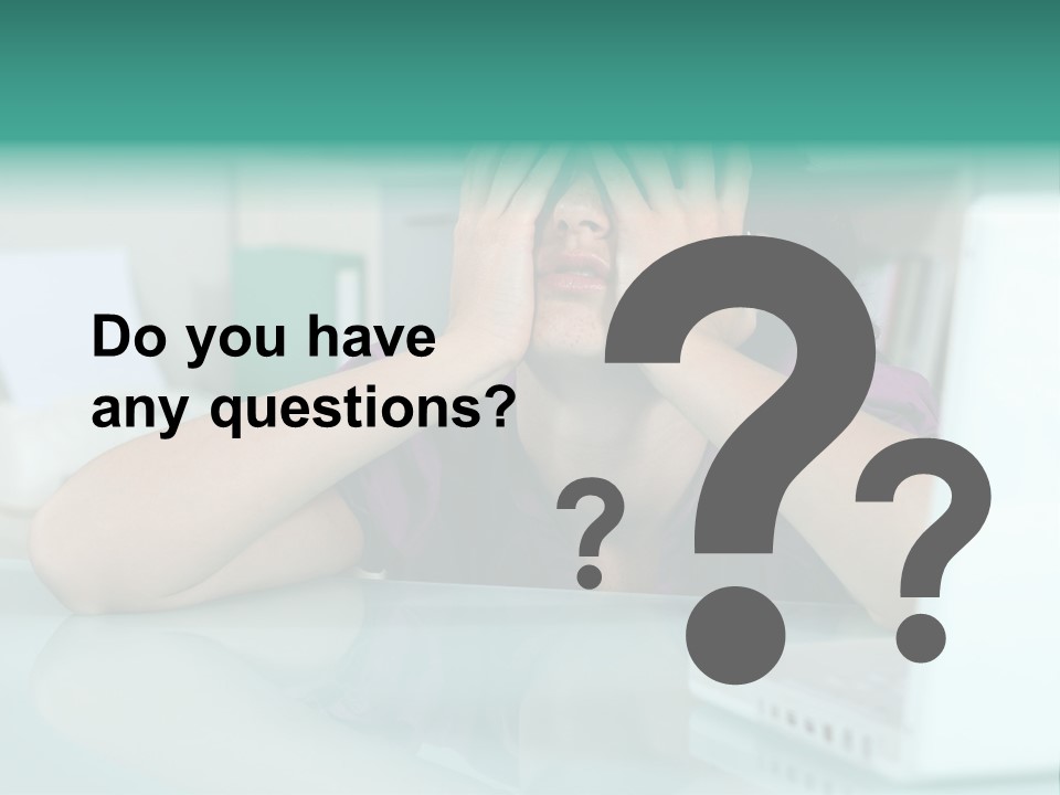 A Woman Covering Her Eyes While Sitting At A Desk PowerPoint Template