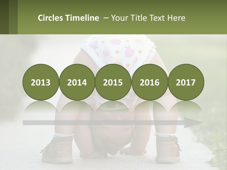 A Baby In A Diaper Doing A Handstand On A Sidewalk PowerPoint Template