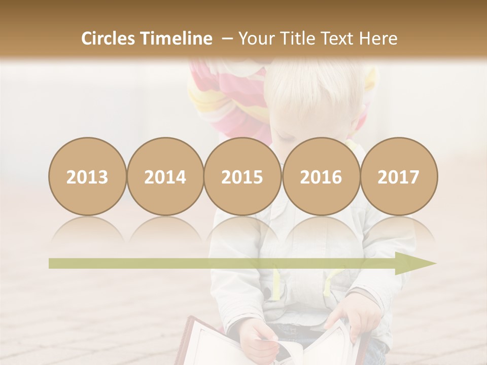 Two Children Sitting On The Ground Reading A Book PowerPoint Template