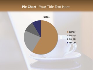 A Cup Of Coffee On A Table Next To A Laptop PowerPoint Template
