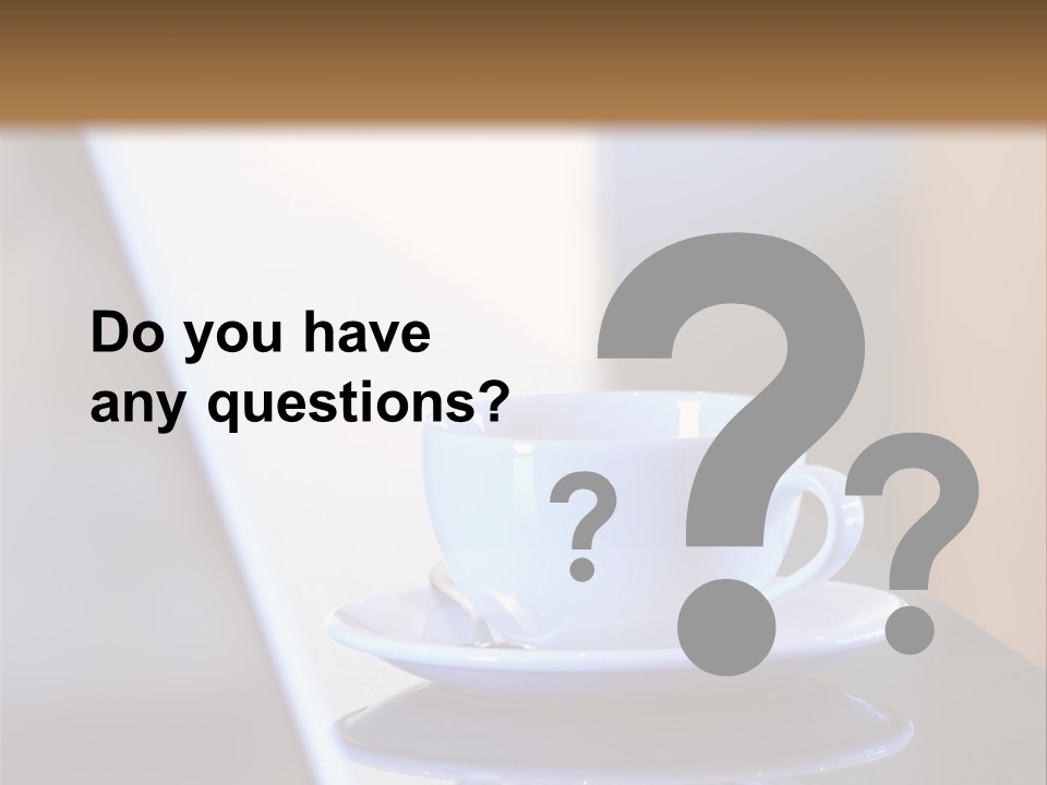 A Cup Of Coffee On A Table Next To A Laptop PowerPoint Template