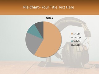 A Microphone And Headphones On A Wooden Table PowerPoint Template