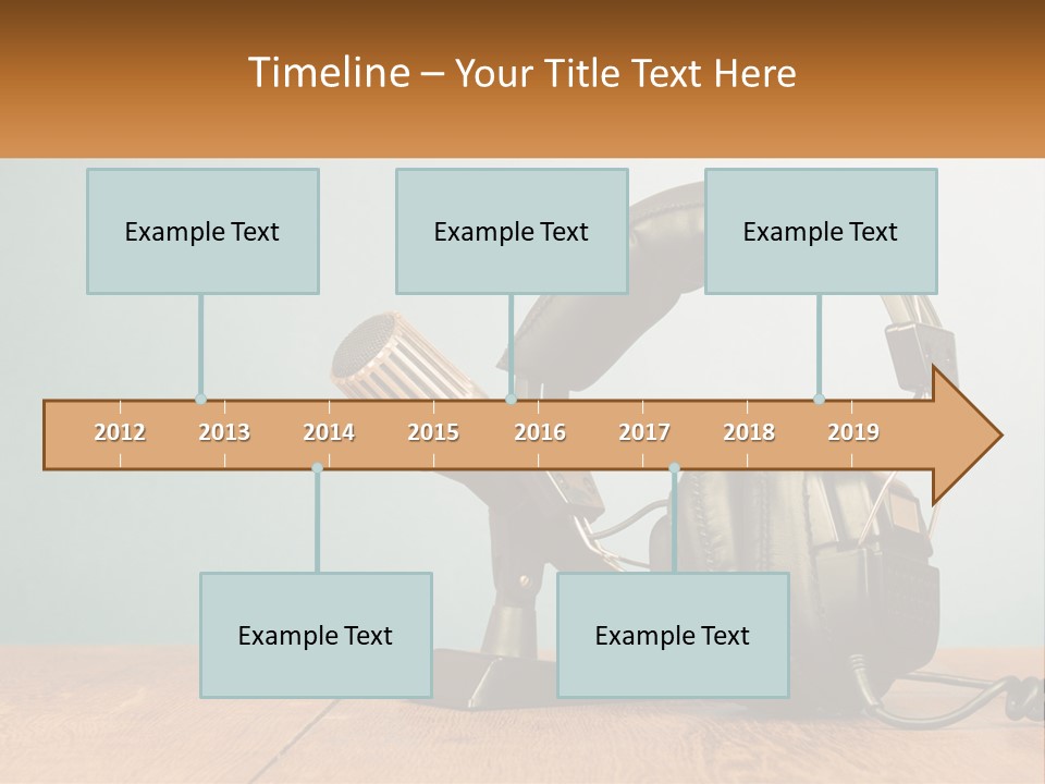 A Microphone And Headphones On A Wooden Table PowerPoint Template