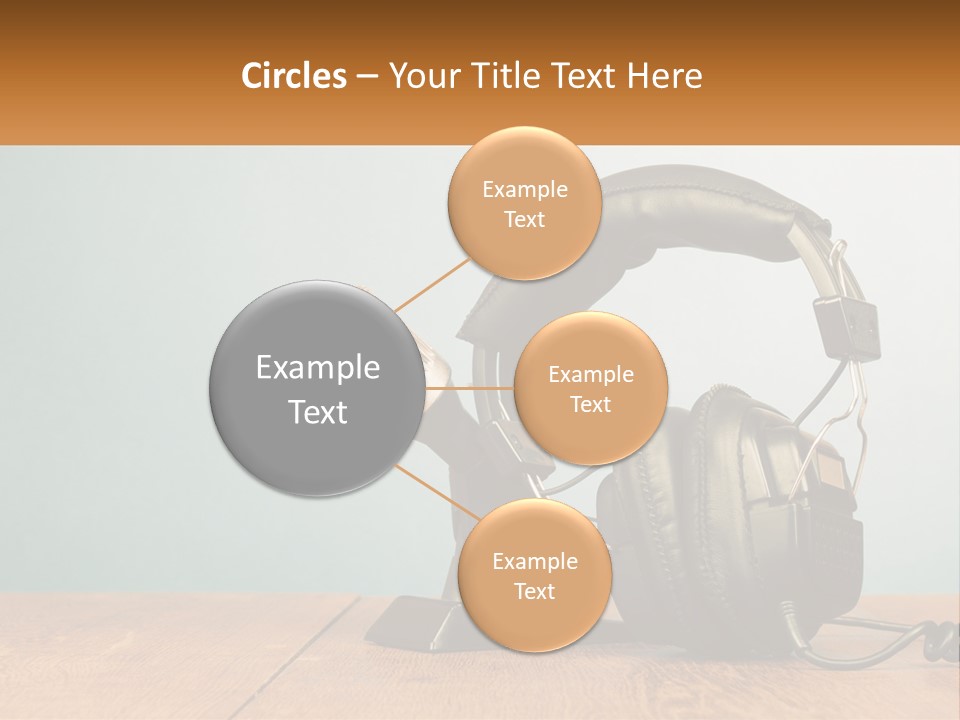 A Microphone And Headphones On A Wooden Table PowerPoint Template