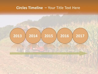 A Red Tractor Driving Down A Road Next To A Corn Field PowerPoint Template