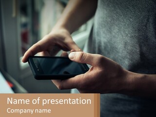 A Person Holding A Cell Phone In Their Hands PowerPoint Template