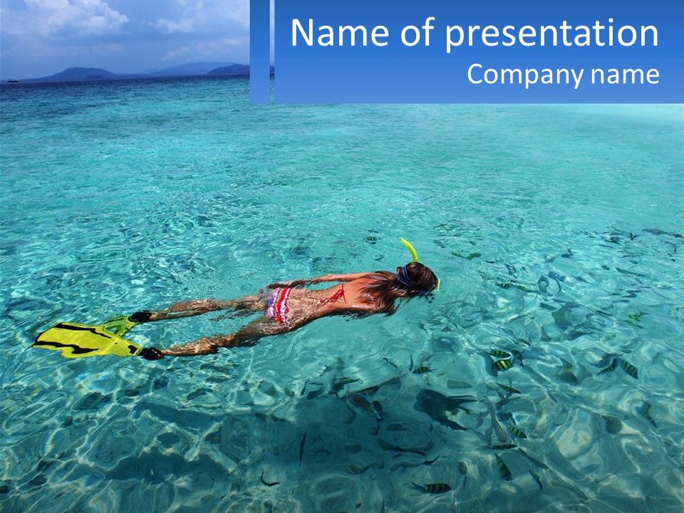 A Woman Swimming In The Ocean With A Snorkel PowerPoint Template