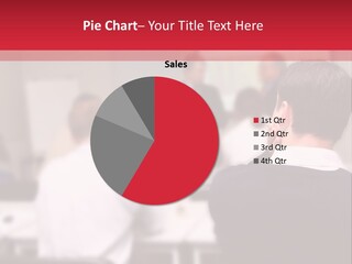 A Group Of People In A Conference Room PowerPoint Template