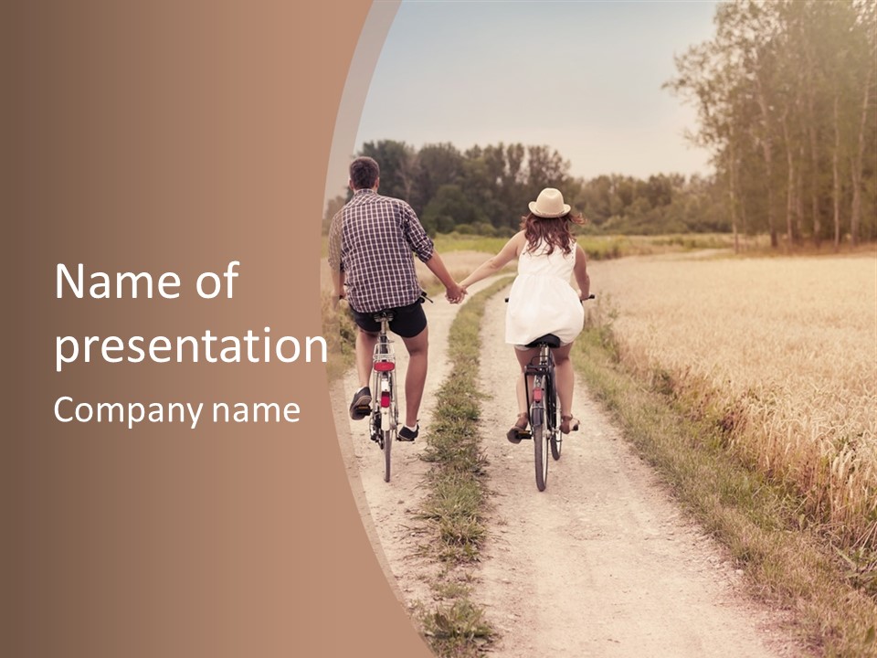 A Man And A Woman Riding Bikes Down A Dirt Road PowerPoint Template