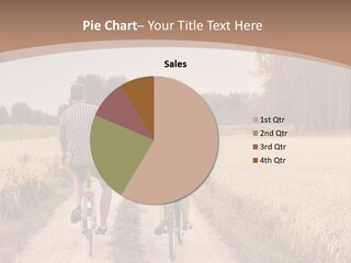 A Man And A Woman Riding Bikes Down A Dirt Road PowerPoint Template