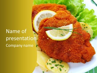 A Plate Of Food With Lemons And Lettuce On It PowerPoint Template
