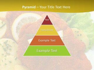 A Plate Of Food With Lemons And Lettuce On It PowerPoint Template