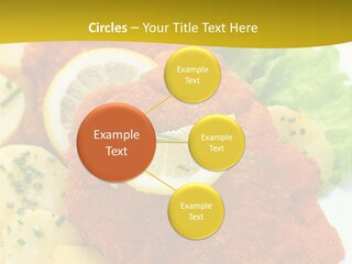 A Plate Of Food With Lemons And Lettuce On It PowerPoint Template