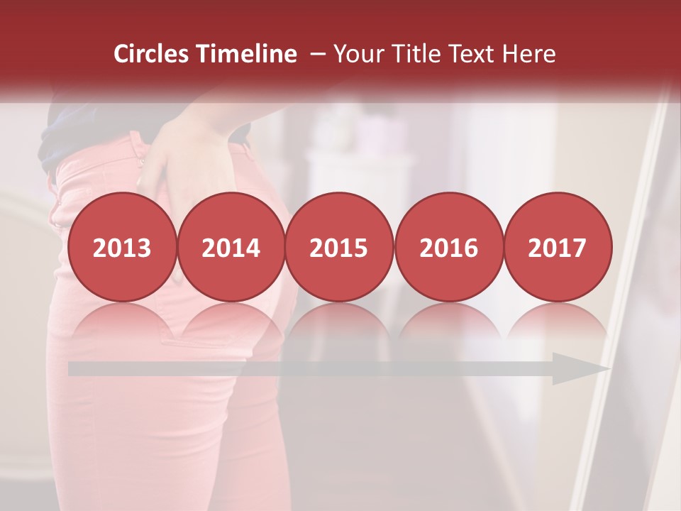 A Woman In Pink Pants Standing In Front Of A Mirror PowerPoint Template