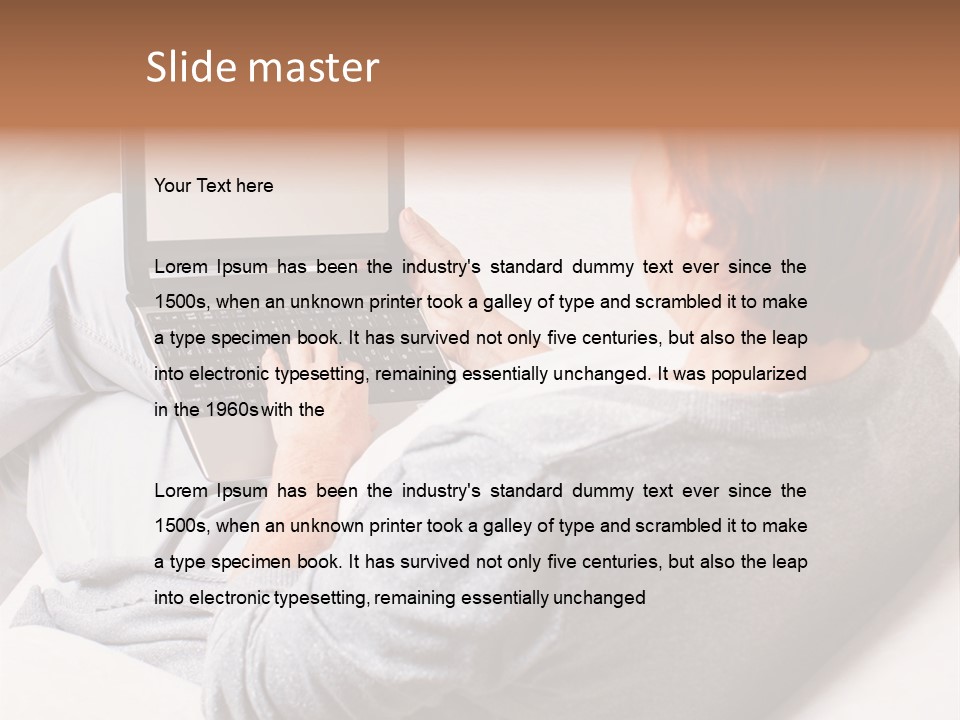 A Woman Sitting On A Couch Using A Laptop Computer PowerPoint Template