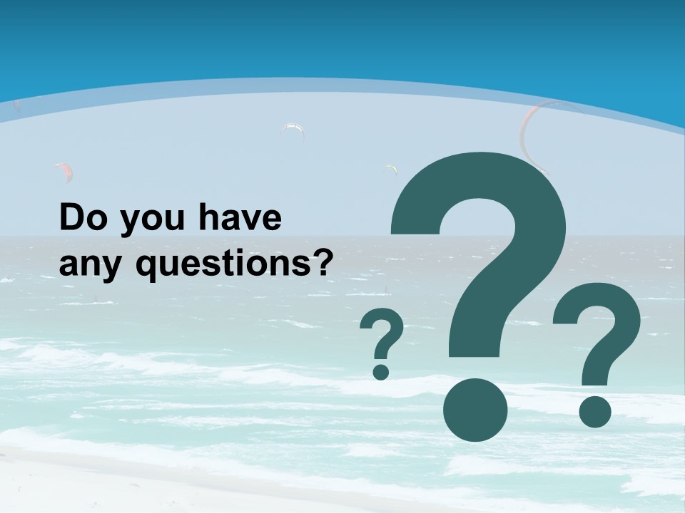 A Group Of Kites Flying Over The Ocean PowerPoint Template