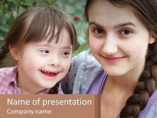 Two Young Girls Are Posing For A Picture PowerPoint Template