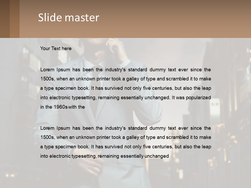 A Man In A Suit Is Talking On A Cell Phone PowerPoint Template