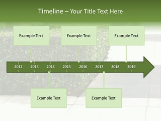 A Row Of Hedges On A Sidewalk In Front Of A Building PowerPoint Template