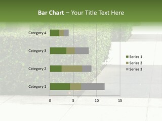 A Row Of Hedges On A Sidewalk In Front Of A Building PowerPoint Template