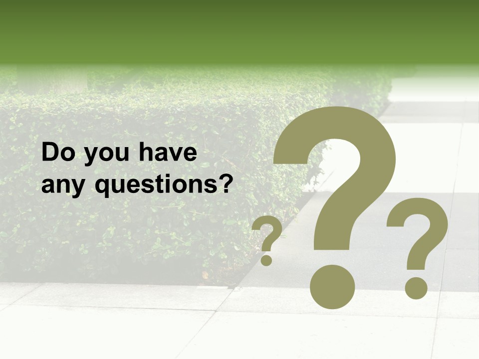 A Row Of Hedges On A Sidewalk In Front Of A Building PowerPoint Template