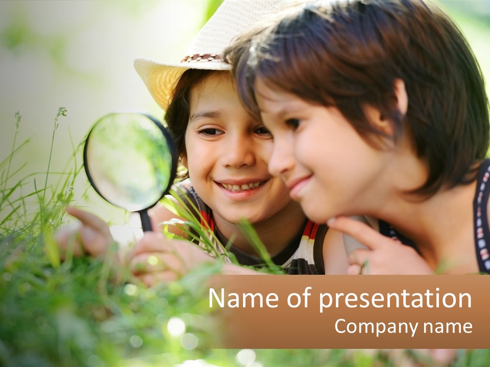 Two Children Looking At Each Other Through A Magnifying Glass PowerPoint Template